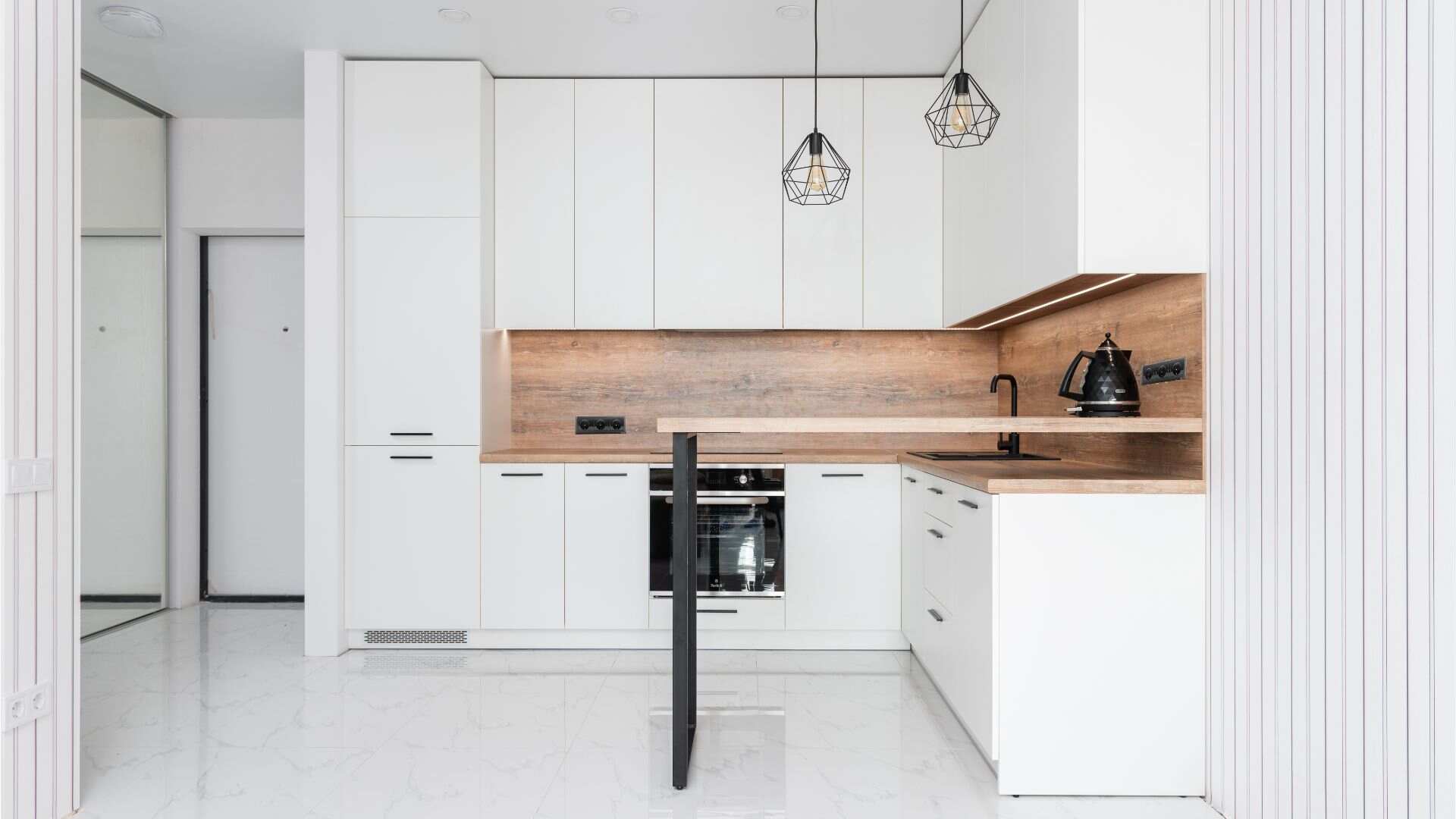 interior of contemporary kitchen with white cabinets